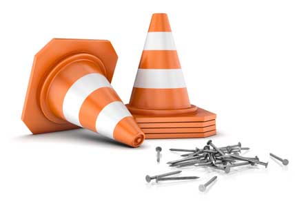 Road cone and nails